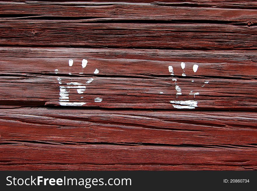 White hands imprint on red wall