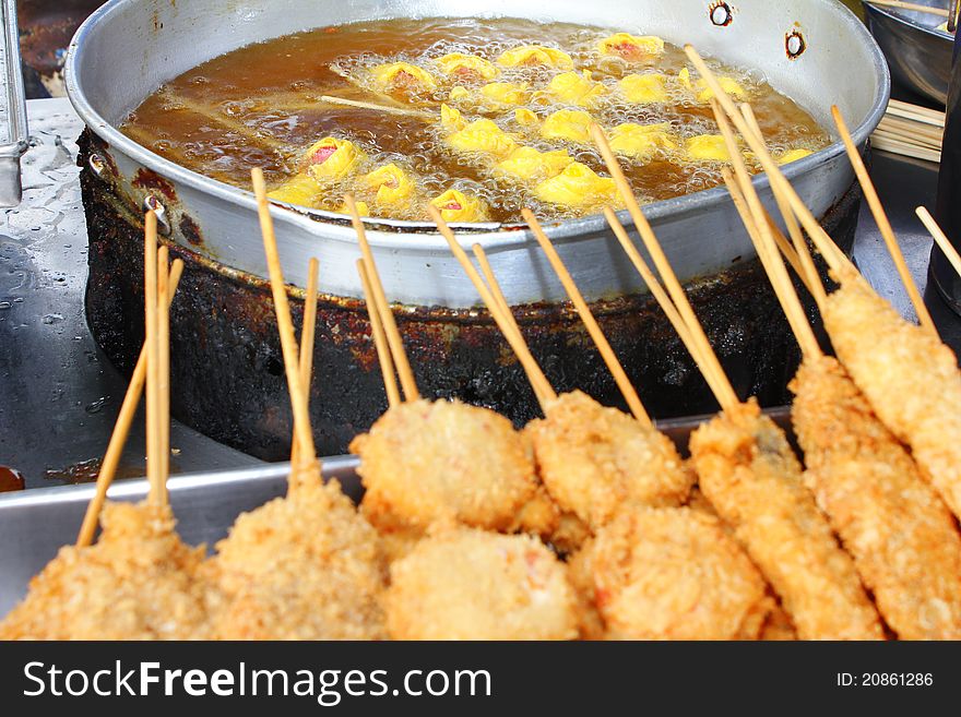 Fried dumplings with skewers food