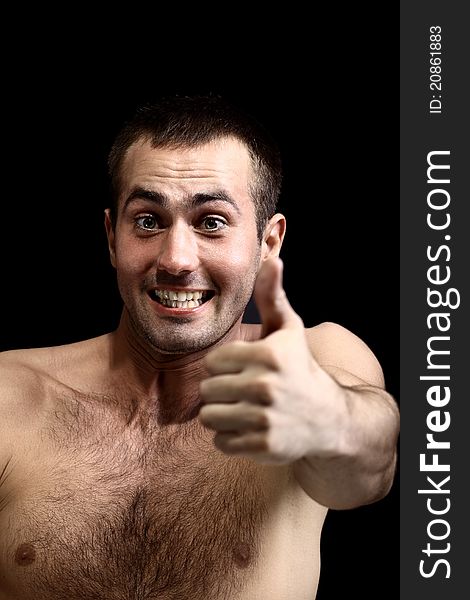 Young man face expressions over black background