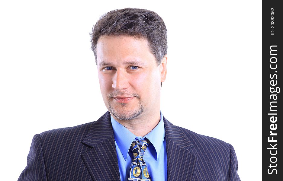 Young businessman standing against isolated white background