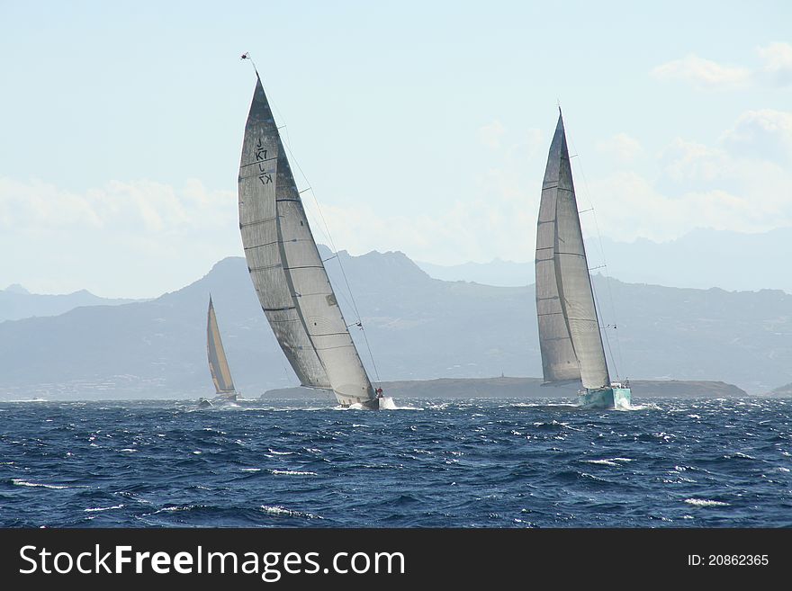 Rolex Maxi Yachts racing in the 2012 Rolex Maxi Race in Sardinia. Rolex Maxi Yachts racing in the 2012 Rolex Maxi Race in Sardinia
