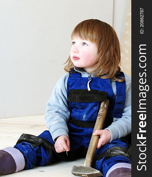 Little girl working with tools. Little girl working with tools