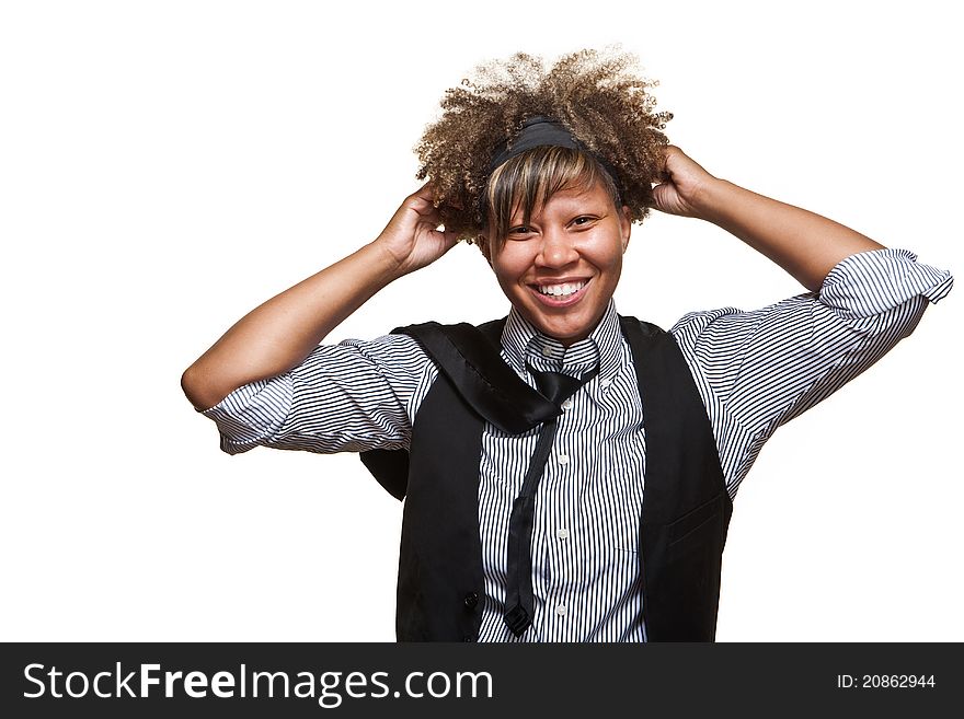 Young African girl is cleaning up her looks in front of a white background. Young African girl is cleaning up her looks in front of a white background.