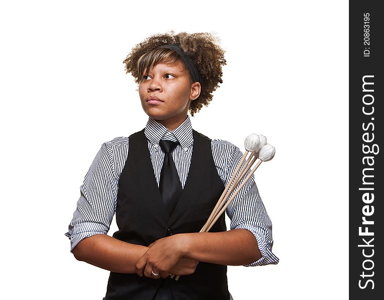 Young African musician in a serious pose against a white background in the studio. Young African musician in a serious pose against a white background in the studio.