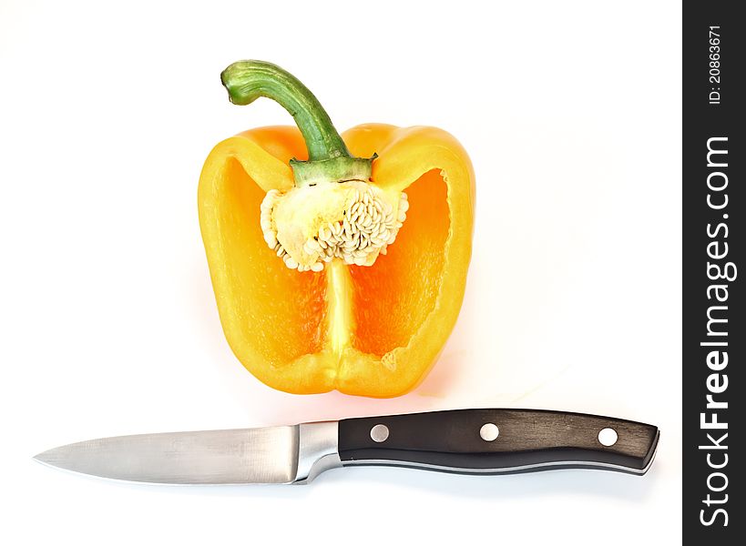 Cut yellow paprika with knife