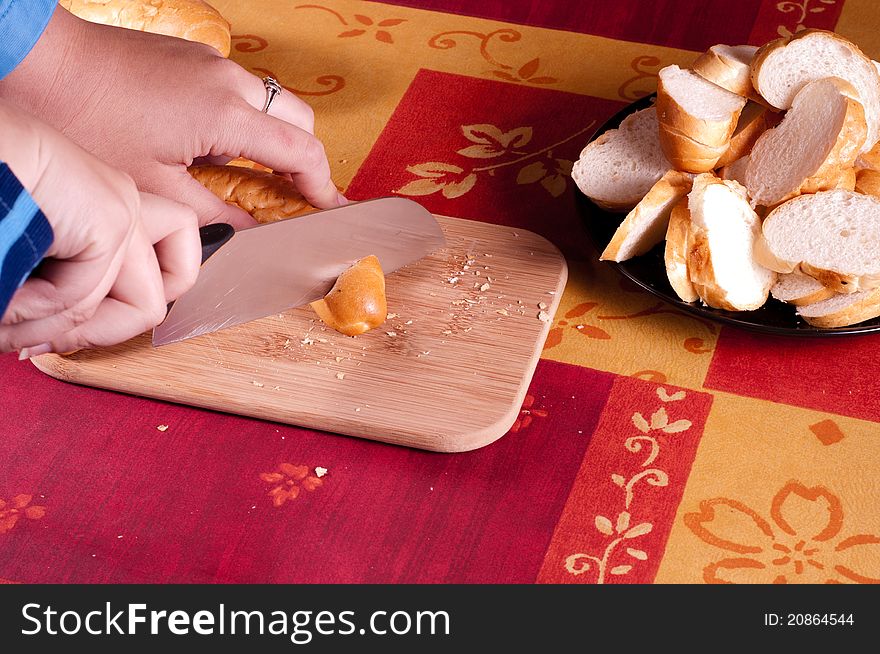 Woman Cutting Crescent Roll