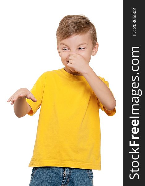 Portrait of little boy covering nose with hand on white background. Portrait of little boy covering nose with hand on white background