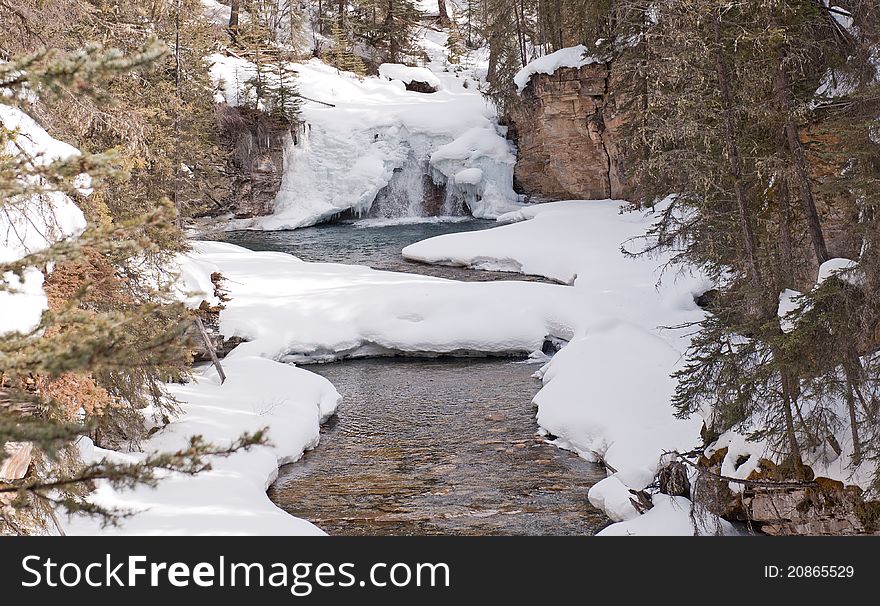 Half frozen creek at Johnston Canyon, Banff National Park, Alberta, Canada