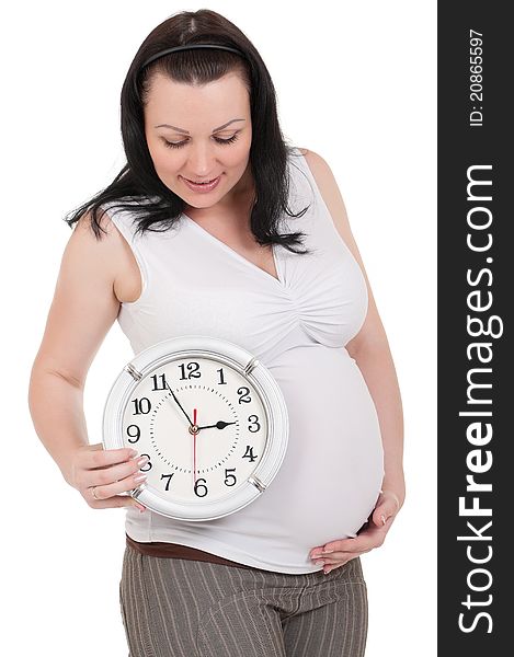 Pregnant belly with clock - isolated over a white background. Third trimester. Pregnant belly with clock - isolated over a white background. Third trimester.