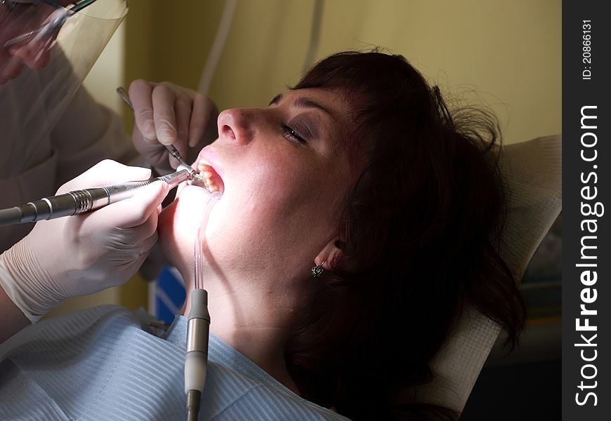 Female Patient At The Dentist