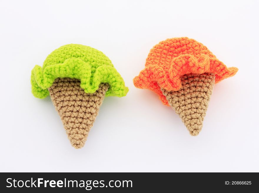 Cute ice cream crochet patterns in orange and green color. Cute ice cream crochet patterns in orange and green color
