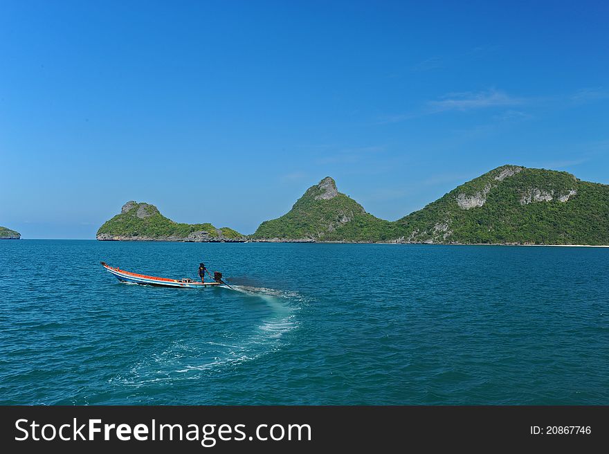 Boat with small engine in sea, Thailand. Boat with small engine in sea, Thailand