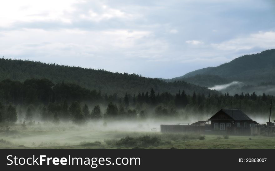 Fog in the evening in the Tunkinsky valley after a rain. Fog in the evening in the Tunkinsky valley after a rain