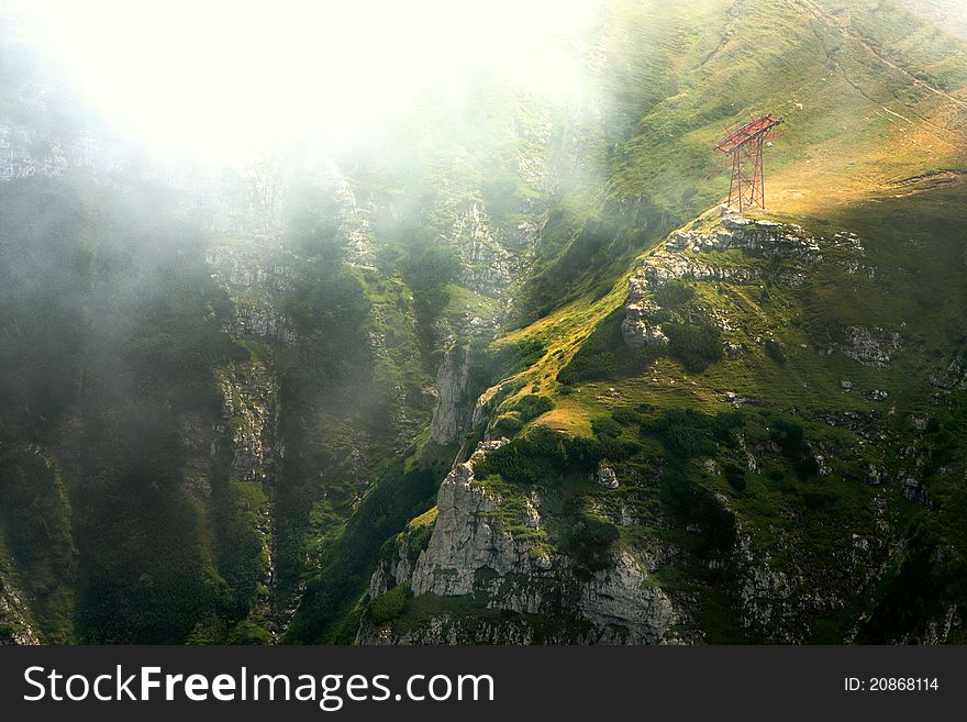 Mountain valley in the mist