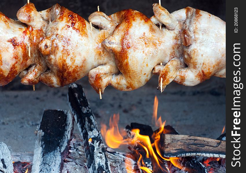 Chicken-grilled prepared over an open fire. Chicken-grilled prepared over an open fire.