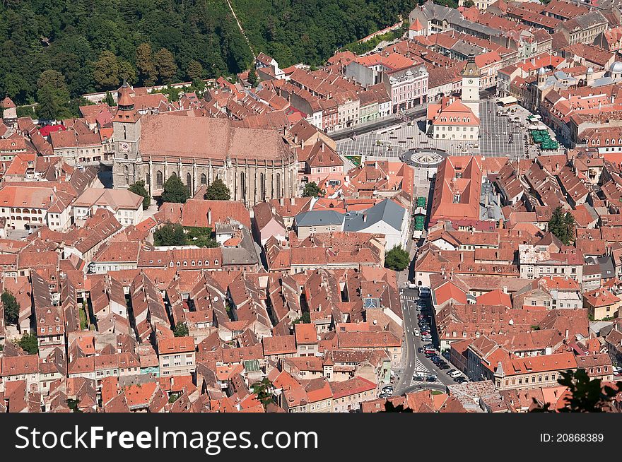 Overview of an old beautiful city in Romania. Aerial panorama of Brasov. Overview of an old beautiful city in Romania. Aerial panorama of Brasov