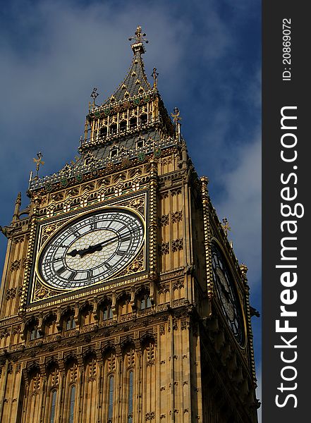 A view of the summit of the world's most famous clock in a blue August sky. A view of the summit of the world's most famous clock in a blue August sky