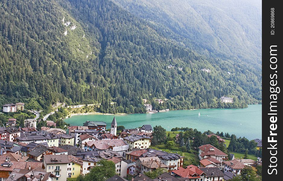 Mountain view with a lake and a typical little city in the northern of Italy. Mountain view with a lake and a typical little city in the northern of Italy.