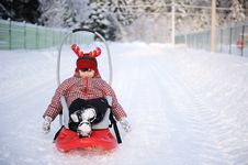 Adorable Child Girl In Horned Hat Sled In Snow Stock Images Adorable Child Girl In Horned Hat Sled In Snow Stock Images