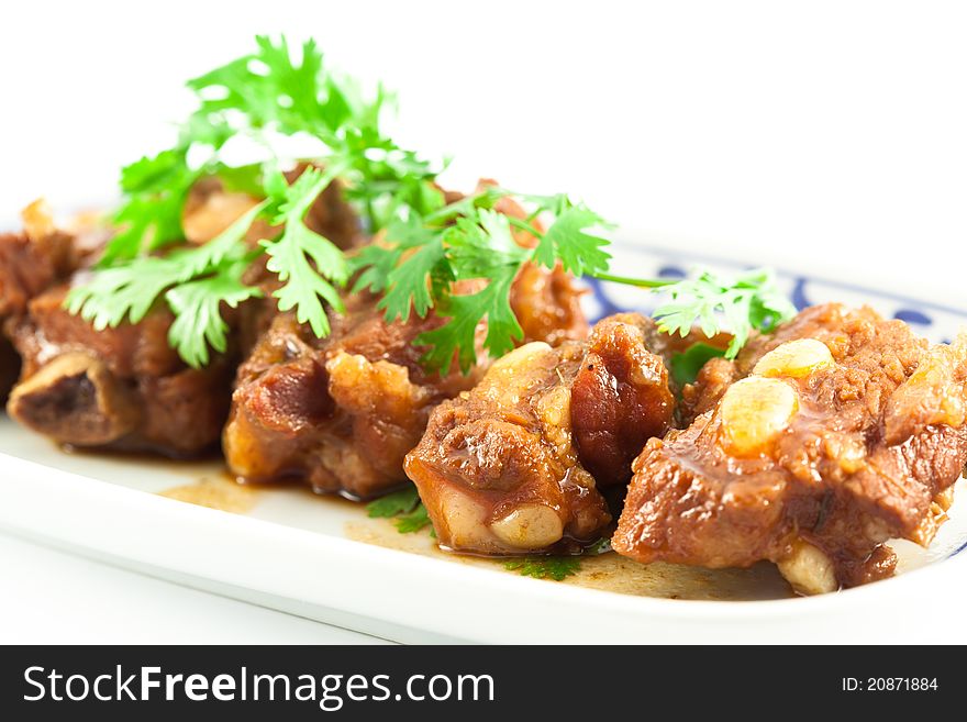 Pork ribs with sweet sauce  on white background