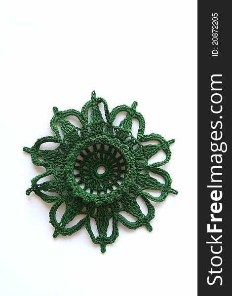 Isolated green star in crochet technik. Isolated green star in crochet technik
