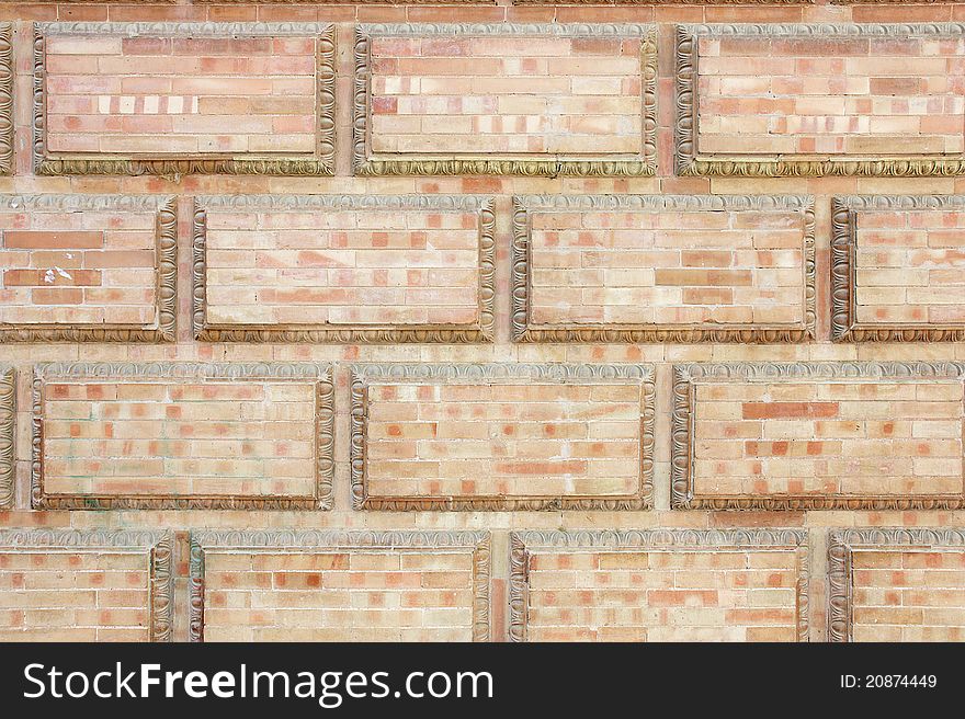 Wallpaper consists of a brick wall in a rectangular style with decorative borders around
