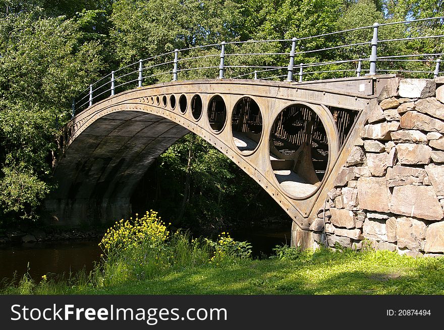 Small metal bridge over a river