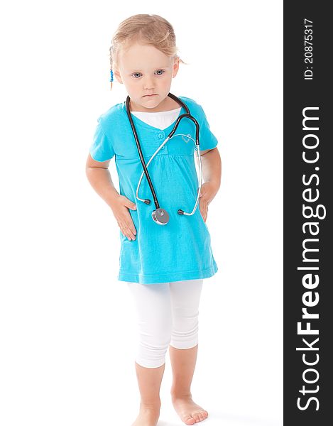 Child is playing with stetoscope like doctor. Child is playing with stetoscope like doctor