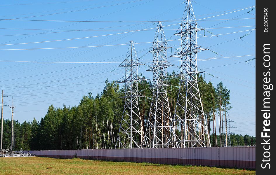 Three metal support of transmission lines of an electricity