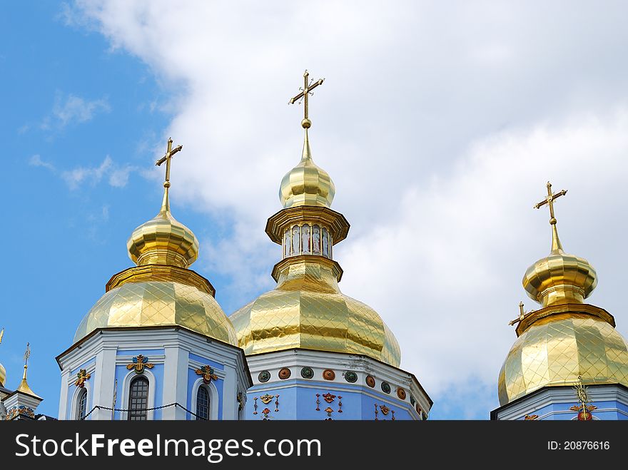 Gold domes against clouds in Kiev
