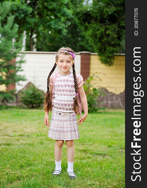 Young Girl With Pink Backpack Ready For School