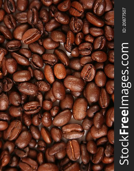 Brown background with coffee beans. Brown background with coffee beans