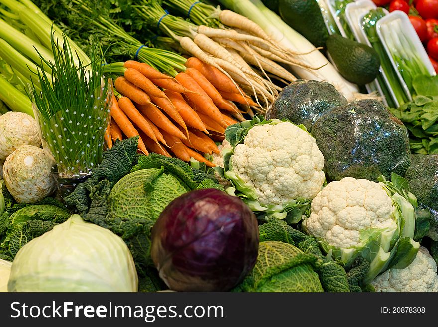 Different sort of vegetables on a stand with shallow dof