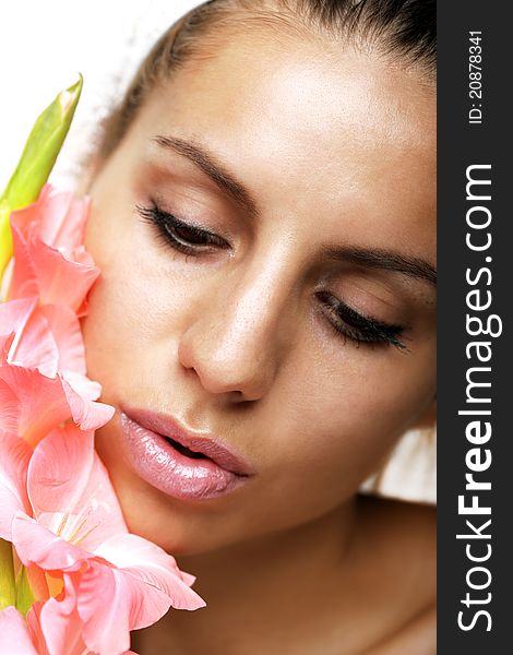 Beauty shot of girl face with flower. Beauty shot of girl face with flower