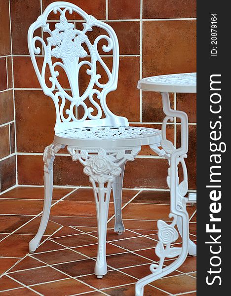 Iron table and chair in carving