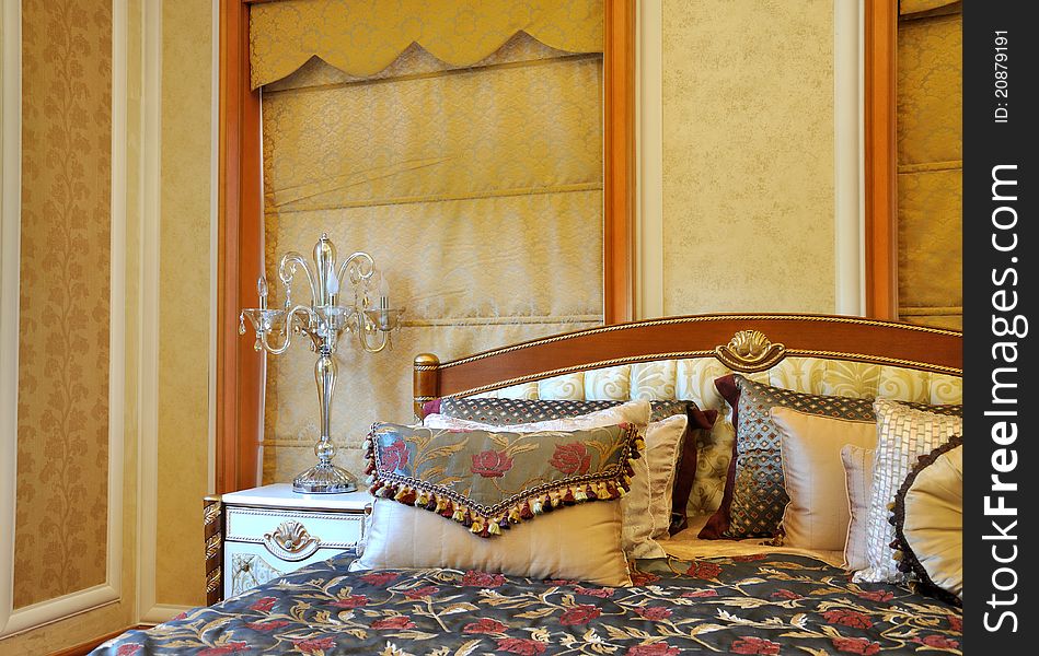 Luxury and noble style bedroom internal, with featured wall paper and decoration, shown as luxury, classical, and comfortable living environment. Luxury and noble style bedroom internal, with featured wall paper and decoration, shown as luxury, classical, and comfortable living environment.