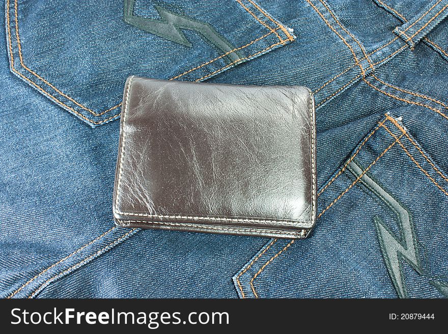 Brown leather wallet, put on jeans for men.