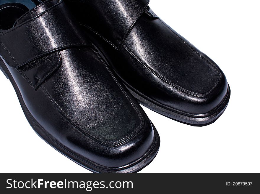 Men's black leather shoes. Place isolated on white background.