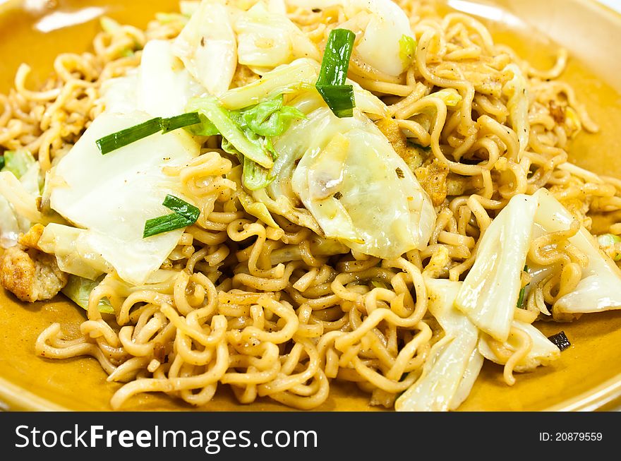 Stir-fried noodles vegetables as a snack for Asians.