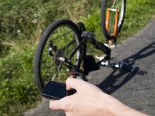Young Cyclist Calling For Help Royalty Free Stock Images Young Cyclist Calling For Help Royalty Free Stock Images
