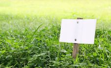 White Signe Board In Green Meodow For Text Writing Royalty Free Stock Images White Signe Board In Green Meodow For Text Writing Royalty Free Stock Images