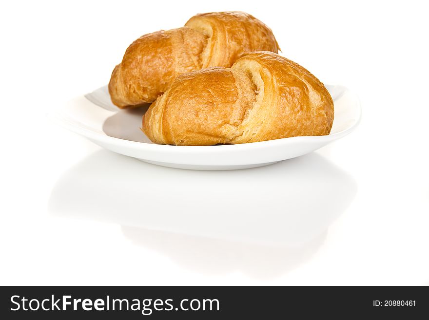 French croissants over white background. French croissants over white background