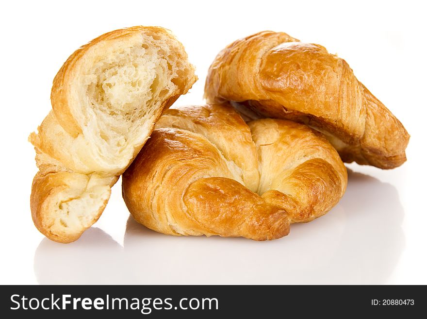 French croissants over white background. French croissants over white background