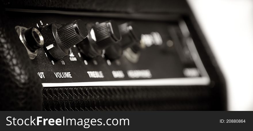 Knobs of different functions on a guitar amp. Knobs of different functions on a guitar amp