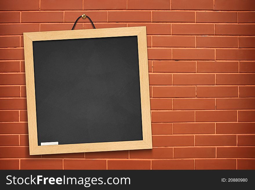 Blackboard on orange wall background. For notes. Recorded messages.