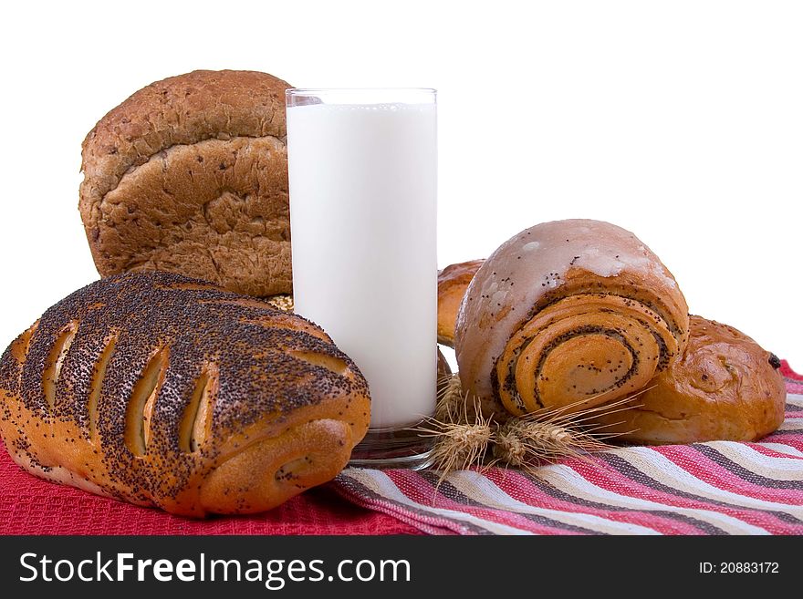 Milk and bread isolated on a white background. Milk and bread isolated on a white background