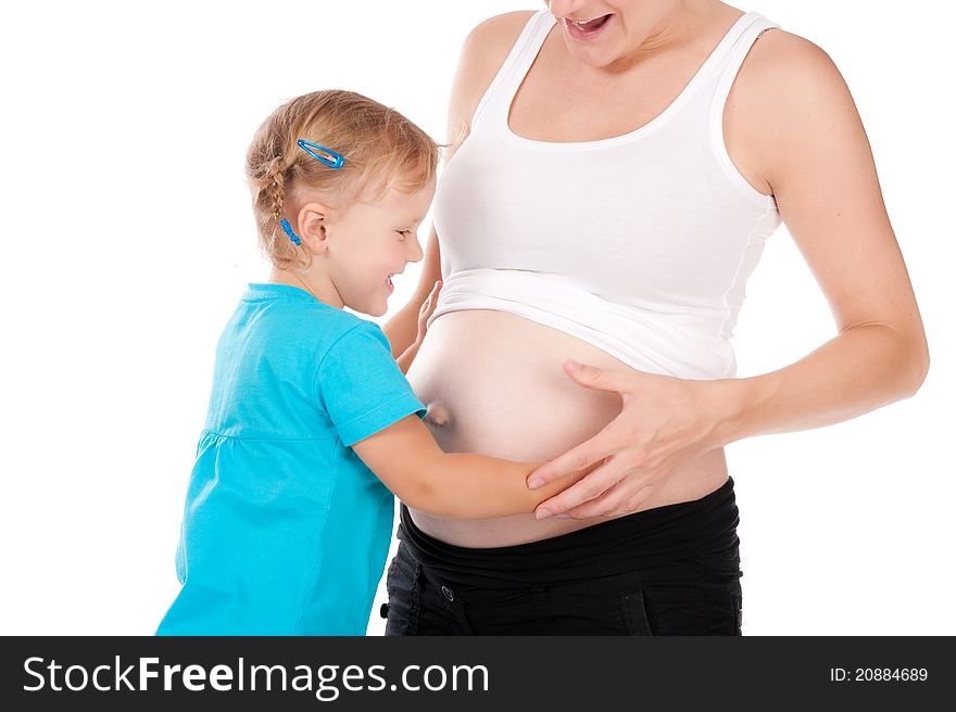 Child hold pregnant belly of mother