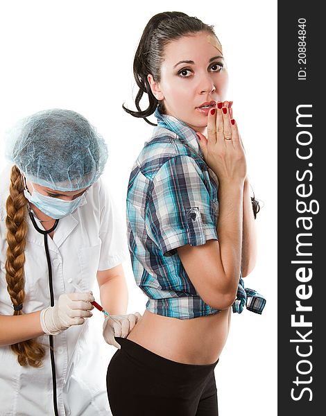 Nurse In A White Coat Makes The Patient An Injecti