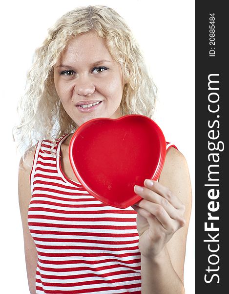 Cute blond holding a red heart