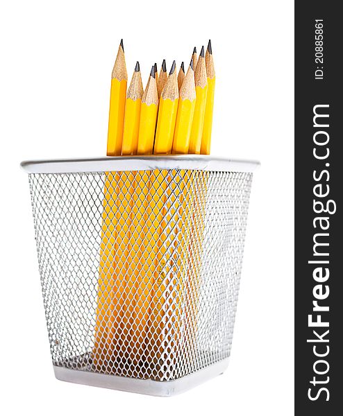 Pencils in pencil holders isolated on white